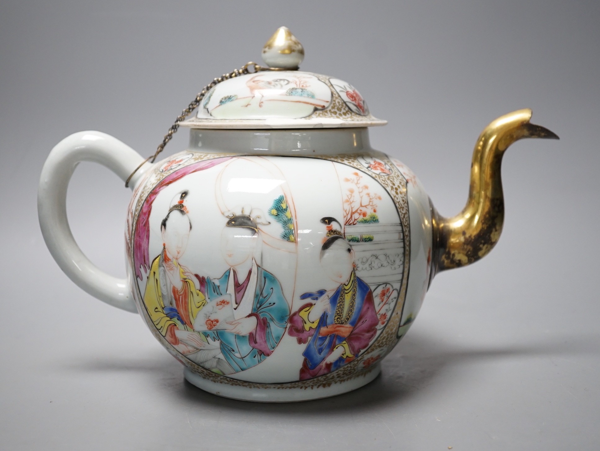 A large Chinese famille rose fencai teapot and cover, Qianlong period, replacement gilt metal spout, cover with restored chips, 20cm tall